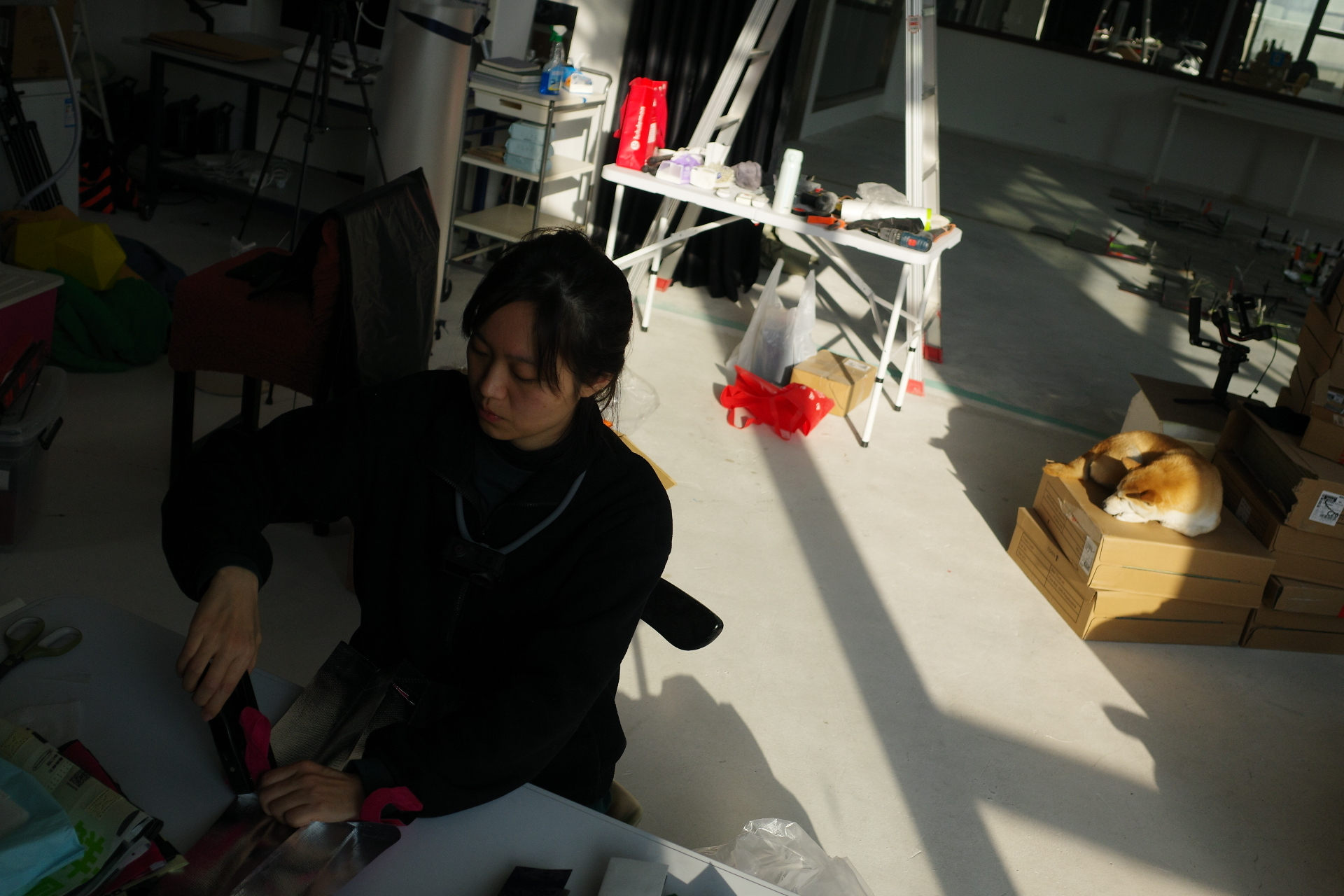 Artist installing the work